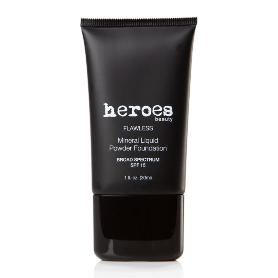 Image of a 1 fluid ounce black tube containing our Flawless Mineral Liquid Powder Foundation with SPF 15. This one is #8-Soft Tan in color.