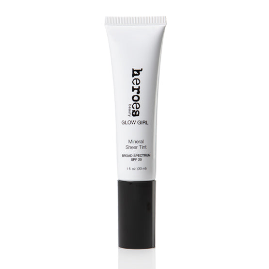 Image of a white tube with a black cap containing our Glow Girl Mineral Sheer Tint with SPF 20. This tube contains our Natural Glow color in a 1.5 fluid ounce tube.