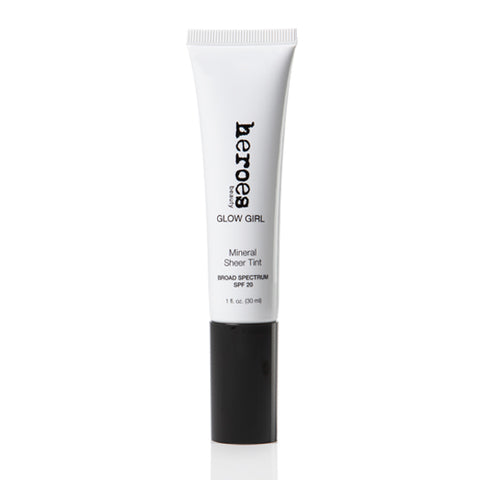 Image of a white tube with a black cap containing our Glow Girl Mineral Sheer Tint with SPF 20.  This tube contains our Fair Glow color in a 1.5 fluid ounce tube. 