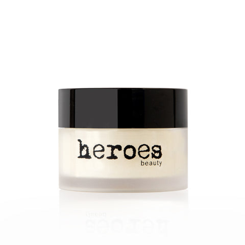 Image of a small .5 ounce frosted glass jar with black lid.  Contains sugar lip scrub.
