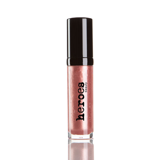 Image of a short clear tube with black lid. It contains our Luxe Lip Gloss in a medium rose colored shimmery pink lip gloss.
