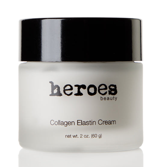 Image of a frosted glass 2 ounce jar with a black lid.  Contains collagen elastin cream.  A night night moisturizer for the face. 