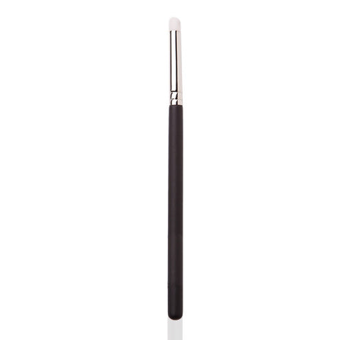 Image of a small make up brush with a sliver and black handle.  The brush tip is rounded and best for blending eyeshadow in the crease area. 