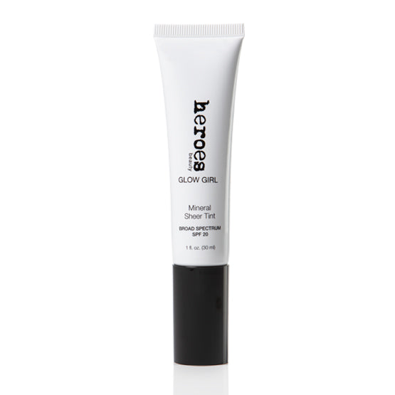 Image of a white tube with a black cap containing our Glow Girl Mineral Sheer Tint with SPF 20.  This tube contains our Natural Glow color in a 1.5 fluid ounce tube. 