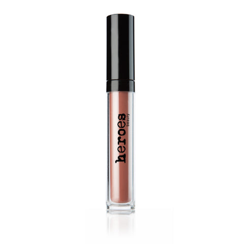 Image of a clear tube with a black lid containing a neutral brownish rose creamy liquid lipstick. n